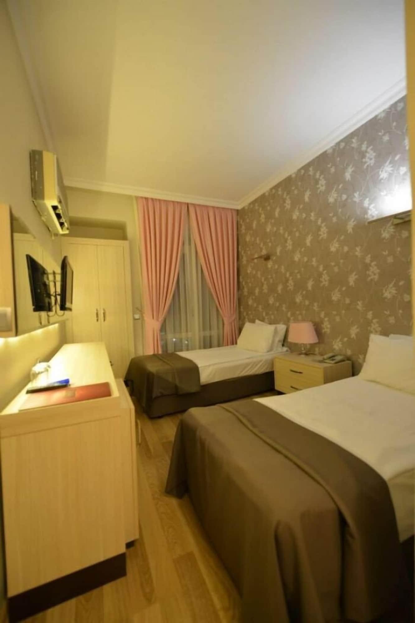 Winecity Hotel เดมเร ภายนอก รูปภาพ